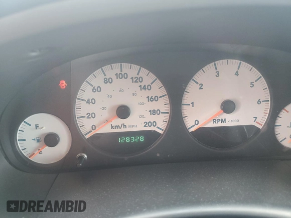 2005 Dodge Caravan SE z VIN 1D4GP25RX5B376541, wystawiony jako Copart lot #55258265 z przebiegiem 128 328 mil mil oraz Szkody całkowita. Historia ofert i sprzedaży dostępna na DreamBid. Obrazek 9.