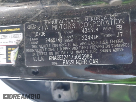 2007 Kia Optima EX with VIN KNAGE124175095989, listed as a IAAI auction lot 41637247 with 174,944 mi miles. Bid and sale history available at carsss.com. Image 9.