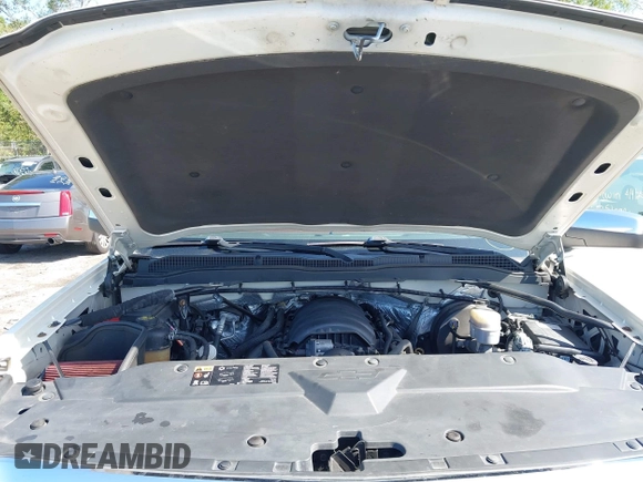 2014 Chevrolet Silverado 1500 High Country with VIN 3GCUKTEC4EG401571, listed as a IAAI auction lot 41984349 with 104,221 mi miles and . Bid and sale history available at DreamBid. Image 10.