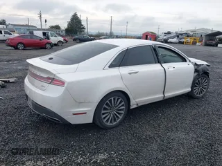 2017 Lincoln MKZ Premiere with VIN 3LN6L5A9XHR643569, listed as a IAAI auction lot 41471423 with 117,875 mi miles and . Bid and sale history available at DreamBid. Image 4.