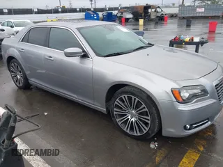 2013 Chrysler 300 with VIN 2C3CCABG3DH736120, listed as a IAAI auction lot 41765794 with 126,268 mi miles. Bid and sale history available at carsss.com. Image 1.