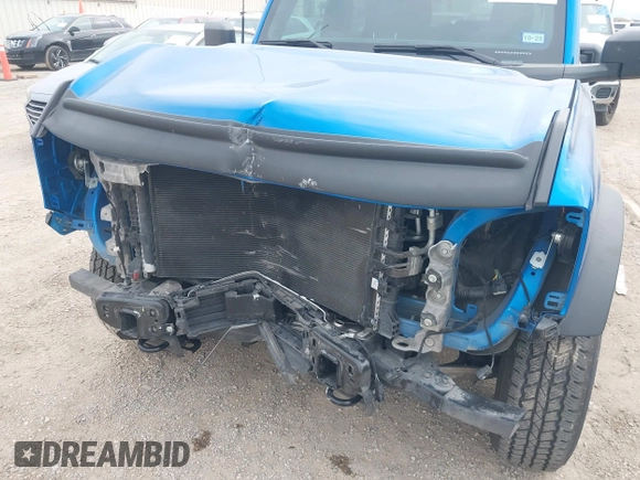 2021 Ford Bronco with VIN 1FMDE5BH7MLA94882, listed as a IAAI auction lot 42354955 with 32,837 mi miles and . Bid and sale history available at DreamBid. Image 6.