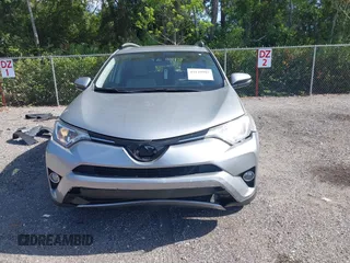 2018 Toyota RAV4 XLE with VIN JTMWFREV9JJ203353, listed as a IAAI auction lot 42129995 with 41,806 mi miles and . Bid and sale history available at DreamBid. Image 13.