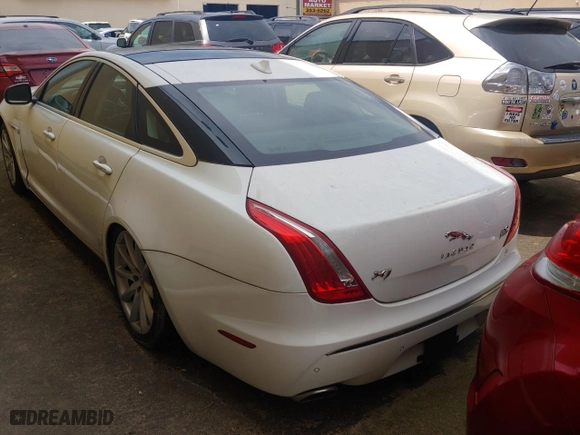 2013 Jaguar XJ with VIN SAJWJ1CD7D8V49599, listed as a Copart auction lot 54008915 with 133,163 mi miles and Clean Title. Bid and sale history available at carsss.com. Image 3.