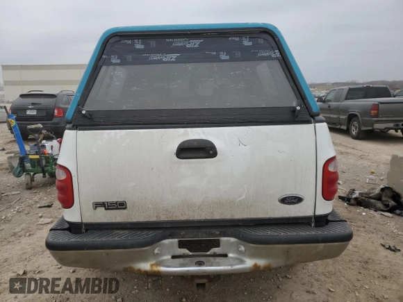 2000 Ford F-150 XL with VIN 2FTRX08L0YCA70958, listed as a Copart auction lot 44517605 with 237,228 mi miles and Salvage title. Bid and sale history available at DreamBid. Image 6.