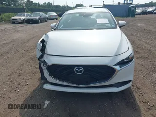 2019 Mazda 3 with VIN 3MZBPABL7KM114298, listed as a IAAI auction lot 42536800 with 53,598 mi miles and . Bid and sale history available at DreamBid. Image 12.