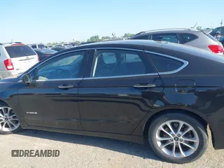 2019 Ford Fusion SEL with VIN 3FA6P0MU5KR203851, listed as a IAAI auction lot 41982637 with 96,954 mi miles and . Bid and sale history available at DreamBid. Image 14.