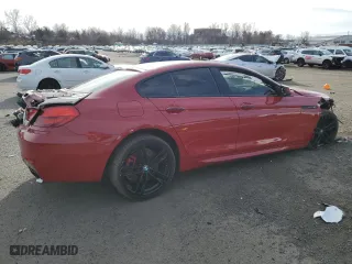 2015 BMW 6 Series 650i with VIN WBA6B2C57FGB99619, listed as a Copart auction lot 83660614 with 51,551 mi miles and Salvage Title. Bid and sale history available at carsss.com. Image 3.