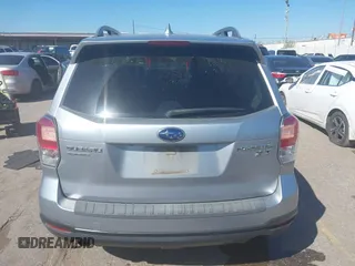 2017 Subaru Forester Touring with VIN JF2SJGTC9HH409665, listed as a IAAI auction lot 41749546 with 118,635 mi miles. Bid and sale history available at carsss.com. Image 16.