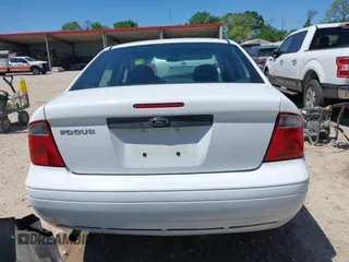 2007 Ford Focus S with VIN 1FAFP34N17W124403, listed as a IAAI auction lot 42021135 with 178,896 mi miles and . Bid and sale history available at carsss.com. Image 17.