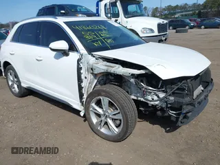 2020 Audi Q3 S line Premium Plus with VIN WA1EECF37L1099564, listed as a IAAI auction lot 41860268 with 55,389 mi miles and . Bid and sale history available at DreamBid. Image 1.