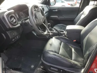 2021 Toyota Tacoma 4WD SR with VIN 3TMCZ5AN7MM371380, listed as a Copart auction lot 49846625 with 57,553 mi miles and Salvage Title. Bid and sale history available at carsss.com. Image 7.