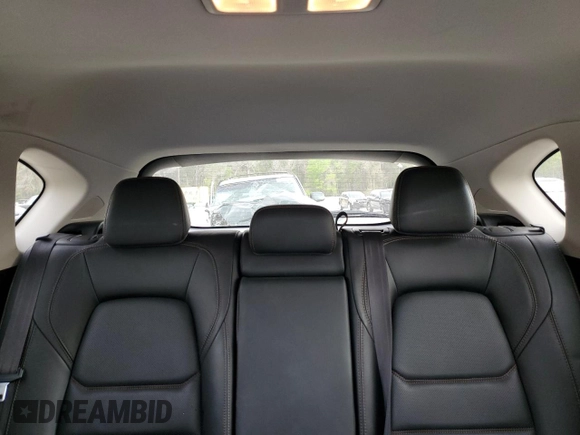 2021 Mazda CX-5 Grand Touring with VIN JM3KFADM8M1339008, listed as a Copart auction lot 49150115 with 144,851 mi miles and Salvage Title. Bid and sale history available at carsss.com. Image 10.