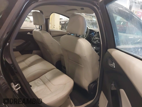2016 Ford Focus Electric with VIN 1FADP3R41GL363586, listed as a IAAI auction lot 41518253 with 36,884 mi miles and . Bid and sale history available at DreamBid. Image 8.