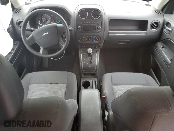 2009 Jeep Patriot Sport z VIN 1J4FF28B19D107312, wystawiony jako Copart lot #52885605 z przebiegiem 149 985 mil mil oraz Nie do naprawy • Non repairable. Historia ofert i sprzedaży dostępna na DreamBid. Obrazek 8.