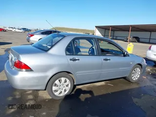 2006 Mitsubishi Lancer ES with VIN JA3AJ26E06U057959, listed as a IAAI auction lot 41347649 with 122,963 mi miles. Bid and sale history available at carsss.com. Image 14.
