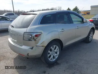 2009 Mazda CX-7 Grand Touring with VIN JM3ER29L890235402, listed as a IAAI auction lot 41834012 with 117,179 mi miles. Bid and sale history available at carsss.com. Image 4.