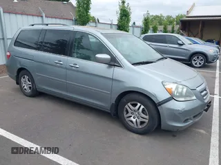 2006 Honda Odyssey EX-L z VIN 5FNRL38726B063127, wystawiony jako IAAI lot #42510763 z przebiegiem 200 815 mil mil oraz . Historia ofert i sprzedaży dostępna na DreamBid. Obrazek 1.