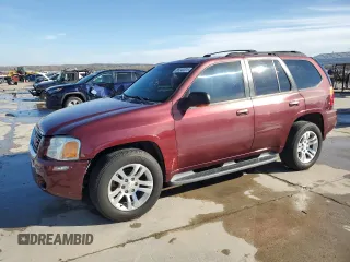 2003 GMC Envoy SLT with VIN 1GKDT13S732378731, listed as a Copart auction lot 88340825 with 125,814 mi miles and Salvage Title. Bid and sale history available at carsss.com. Image 1.