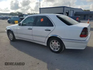 1999 Mercedes-Benz C 230/260/280/320 with VIN WDBHA24G5XA780454, listed as a Copart auction lot 73794674 with 90,578 mi miles and Salvage Title. Bid and sale history available at carsss.com. Image 2.