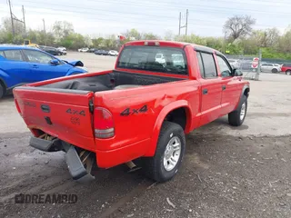 2003 Dodge Dakota Sport with VIN 1D7HG38X63S212434, listed as a IAAI auction lot 42030739 with 181,098 mi miles. Bid and sale history available at carsss.com. Image 14.