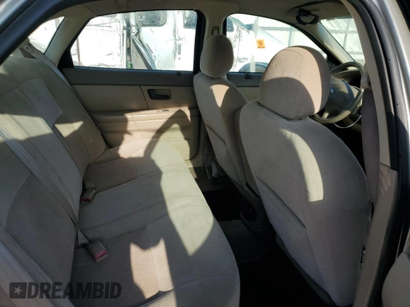 2003 Ford Taurus LX Standard with VIN 1FAFP52U13G243207, listed as a Copart auction lot 52763905 with 49,906 mi miles and Salvage title. Bid and sale history available at DreamBid. Image 10.