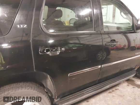 2012 Chevrolet Tahoe LTZ with VIN 1GNSKCE02CR297261, listed as a IAAI auction lot 40255137 with 283,110 mi miles and . Bid and sale history available at DreamBid. Image 21.