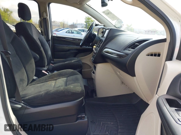 2015 Dodge Grand Caravan SE with VIN 2C4RDGBG9FR660423, listed as a IAAI auction lot 42184835 with 90,356 mi miles and . Bid and sale history available at DreamBid. Image 5.