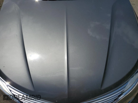 2016 Lincoln MKZ z VIN 3LN6L2J96GR601039, wystawiony jako Copart lot #63209425 z przebiegiem 151 629 mil mil oraz Szkoda całkowita • Salvage title. Historia ofert i sprzedaży dostępna na DreamBid. Obrazek 11.
