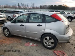 2004 Ford Focus with VIN 3FAFP37Z94R105076, listed as a Copart auction lot 82924224 with 218,253 mi miles and Clean title. Bid and sale history available at DreamBid. Image 2.