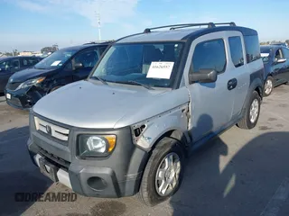 2007 Honda Element LX with VIN 5J6YH18357L012597, listed as a IAAI auction lot 41626557 with 209,648 mi miles and . Bid and sale history available at DreamBid. Image 18.
