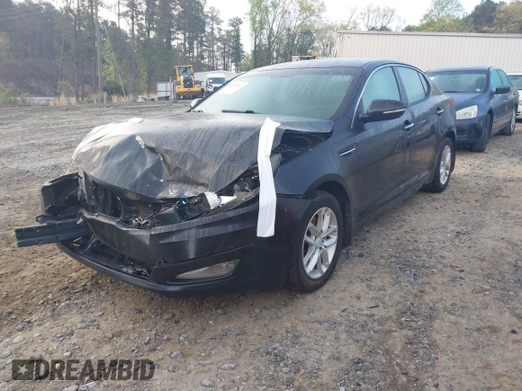 2012 Kia Optima LX with VIN KNAGM4A75C5277916, listed as a IAAI auction lot 41920967 with 274,972 mi miles and . Bid and sale history available at carsss.com. Image 2.