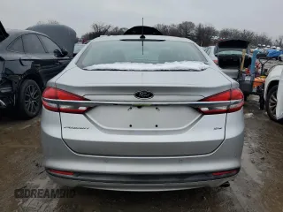 2018 Ford Fusion SE z VIN 3FA6P0H79JR270777, wystawiony jako Copart lot #45319755 z przebiegiem 69 152 mil mil oraz Szkoda całkowita • Salvage title. Historia ofert i sprzedaży dostępna na DreamBid. Obrazek 6.