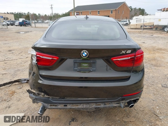 2015 BMW X6 xDrive35i z VIN 5UXKU2C56F0N76862, wystawiony jako IAAI lot #41747776 z przebiegiem 119 426 mil mil oraz . Historia ofert i sprzedaży dostępna na DreamBid. Obrazek 17.