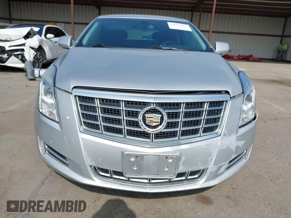 2014 Cadillac XTS Luxury with VIN 2G61N5S30E9294994, listed as a IAAI auction lot 42617654 with 159,573 mi miles and . Bid and sale history available at DreamBid. Image 13.