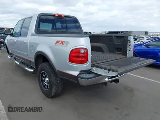 2003 Ford F-150 XLT with VIN 1FTRW08LX3KC79700, listed as a IAAI auction lot 41680562 with 131,052 mi miles. Bid and sale history available at carsss.com. Image 3.