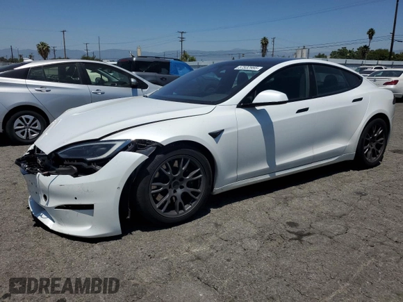 2023 Tesla Model S z VIN 5YJSA1E58PF500032, wystawiony jako Copart lot #57532955 z przebiegiem Nie podano mil oraz Szkoda całkowita • Salvage title. Historia ofert i sprzedaży dostępna na DreamBid. Obrazek 1.
