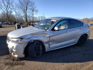 2018 BMW X4 M40i z VIN 5UXXW7C52J0W64488, wystawiony jako Copart lot #46921395 z przebiegiem 52 647 mil mil oraz Szkody całkowita. Historia ofert i sprzedaży dostępna na DreamBid. Obrazek 1.