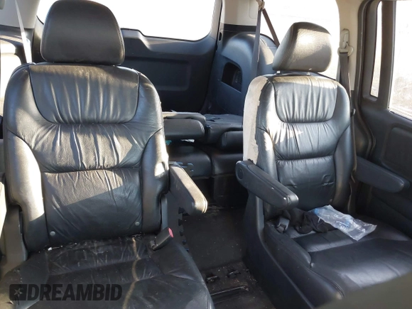 2010 Honda Odyssey Touring with VIN 5FNRL3H95AB031007, listed as a IAAI auction lot 41852435 with 207,919 mi miles. Bid and sale history available at carsss.com. Image 8.