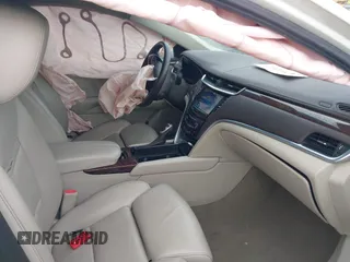 2014 Cadillac XTS Luxury with VIN 2G61M5S3XE9185493, listed as a IAAI auction lot 41711302 with 89,725 mi miles. Bid and sale history available at carsss.com. Image 5.