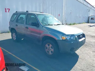 2005 Ford Escape XLS Value with VIN 1FMYU92Z75KA80475, listed as a IAAI auction lot 42632412 with 105,668 mi miles and . Bid and sale history available at DreamBid. Image 1.