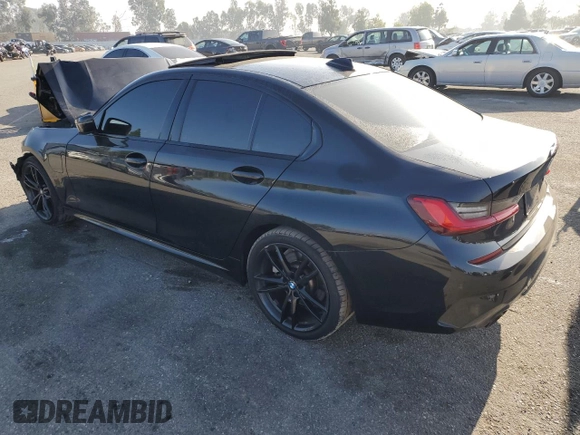 2021 BMW 3 Series 330e with VIN 3MW5P7J03M8C03997, listed as a Copart auction lot 83113614 with 0 mi miles and Salvage Title. Bid and sale history available at carsss.com. Image 2.