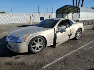 2006 Cadillac XLR z VIN 1G6YV36AX65603770, wystawiony jako Copart lot #81527954 z przebiegiem 59 498 mil mil oraz Szkody całkowita. Historia ofert i sprzedaży dostępna na DreamBid. Obrazek 1.