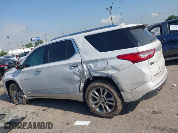 2020 Chevrolet Traverse High Country with VIN 1GNEVNKWXLJ135322, listed as a IAAI auction lot 42042466 with 105,748 mi miles and . Bid and sale history available at DreamBid. Image 14.