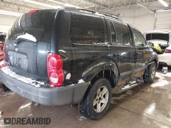 2005 Dodge Durango SXT with VIN 1D4HB38N15F610902, listed as a IAAI auction lot 41599584 with 175,661 mi miles and . Bid and sale history available at DreamBid. Image 4.