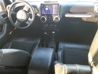 2012 Jeep Wrangler Unlimited Rubicon with VIN 1C4HJWFG1CL221083, listed as a Copart auction lot 80081654 with 163,912 mi miles and Salvage title. Bid and sale history available at DreamBid. Image 8.