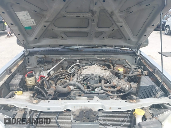 2002 Nissan Frontier XE z VIN 1N6ED26YX2C353086, wystawiony jako IAAI lot #41821399 z przebiegiem 192 027 mil mil oraz . Historia ofert i sprzedaży dostępna na DreamBid. Obrazek 10.