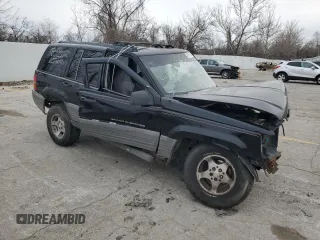 1998 Jeep Grand Cherokee Laredo with VIN 1J4FX58S1WC348125, listed as a Copart auction lot 86061674 with 0 mi miles and Salvage Title. Bid and sale history available at carsss.com. Image 4.