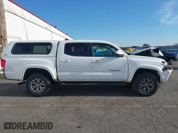 2017 Toyota Tacoma SR5 with VIN 3TMAZ5CN3HM045330, listed as a IAAI auction lot 41371012 with 20,170 mi miles and . Bid and sale history available at DreamBid. Image 14.