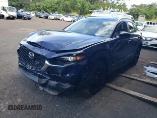 2024 Mazda CX-30 S Select Sport z VIN 3MVDMBBM0RM652983, wystawiony jako Copart lot #57916835 z przebiegiem 8067 mil mil oraz Tytuł czysty. Historia ofert i sprzedaży dostępna na DreamBid. Obrazek 1.